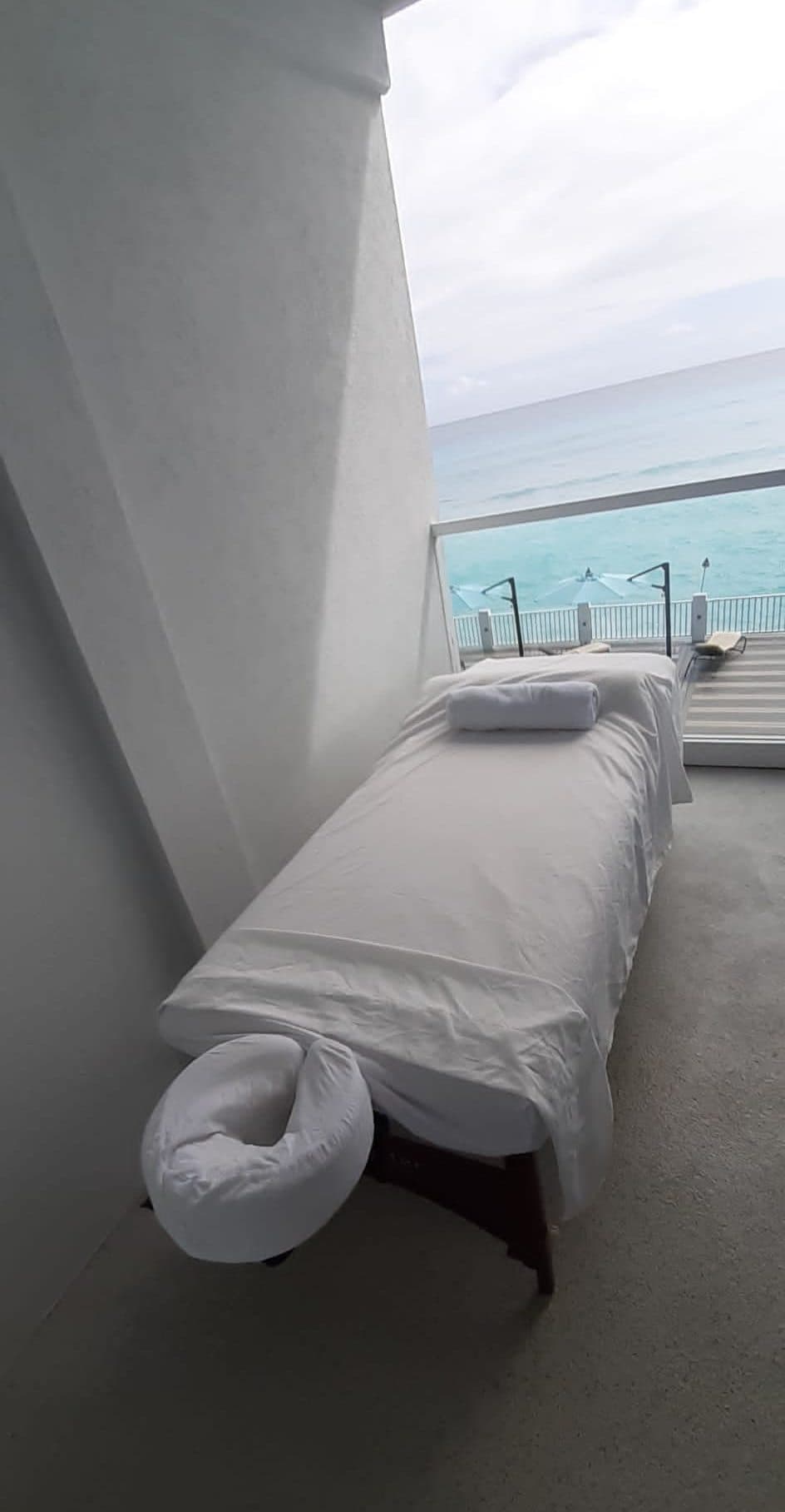 Massage table set up on a balcony with a sea view for a Swedish massage in Barbados